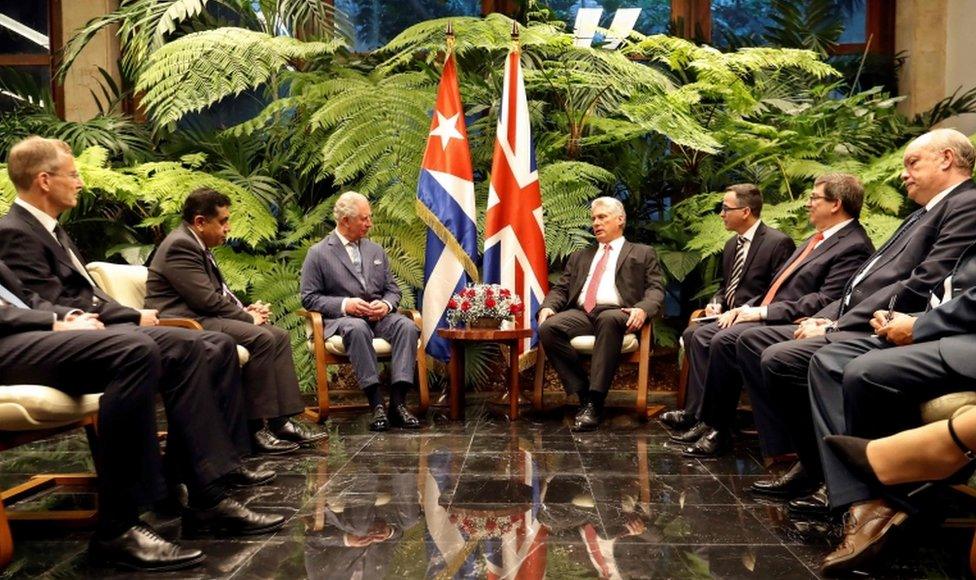 President Miguel Diaz-Canel and others sit with Prince Charles