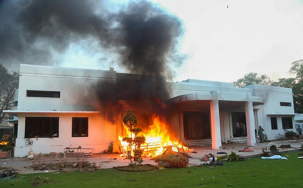 A view of a house in cantonment area, which was set afire by supporters of Pakistan's former Prime Minister Imran Khan during a protest against his arrest, in Lahore, Pakistan May 9, 2023.