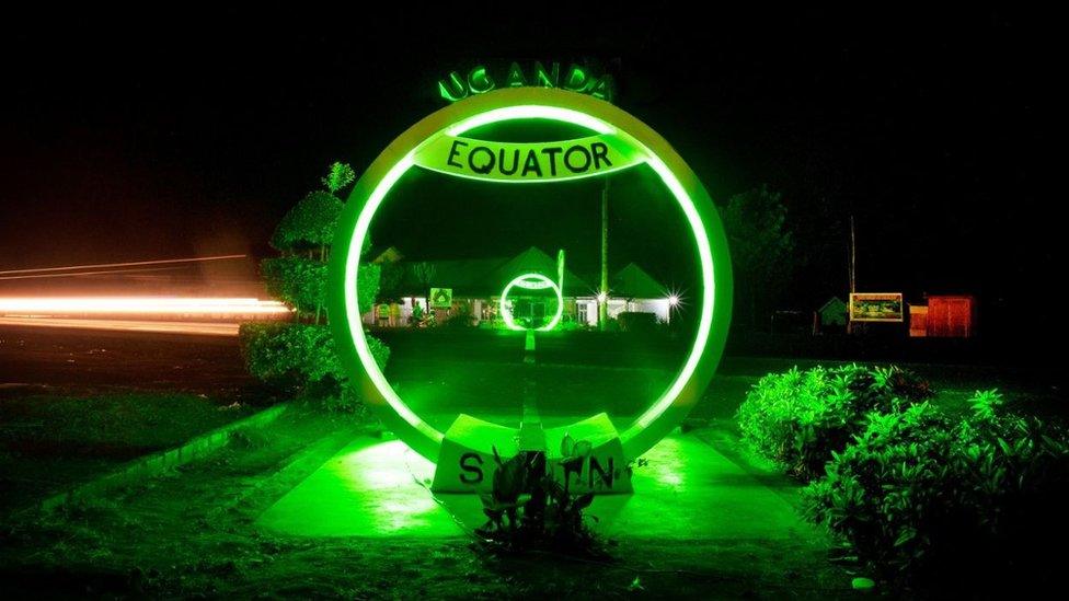 St Patrick's green belt stretched to the equator sign in Uganda