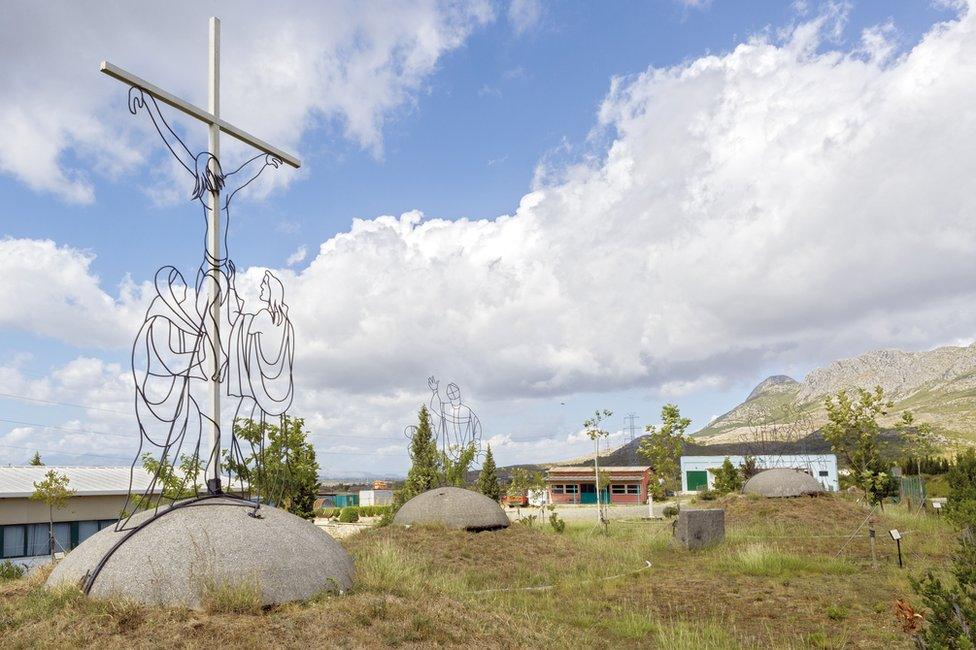 Bunkers in Albania with a religious iconography on the roofs