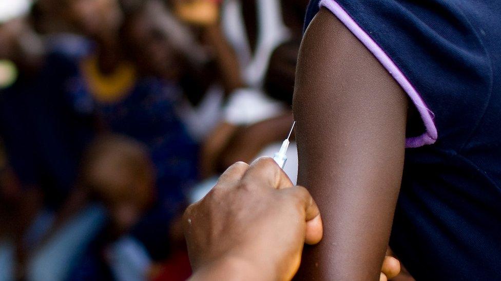 Someone receiving a yellow fever vaccine - archive shot