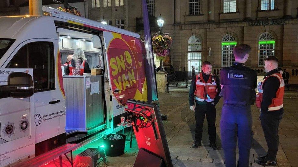 Northampton Guardians standing next to the SNO Van with a police officer