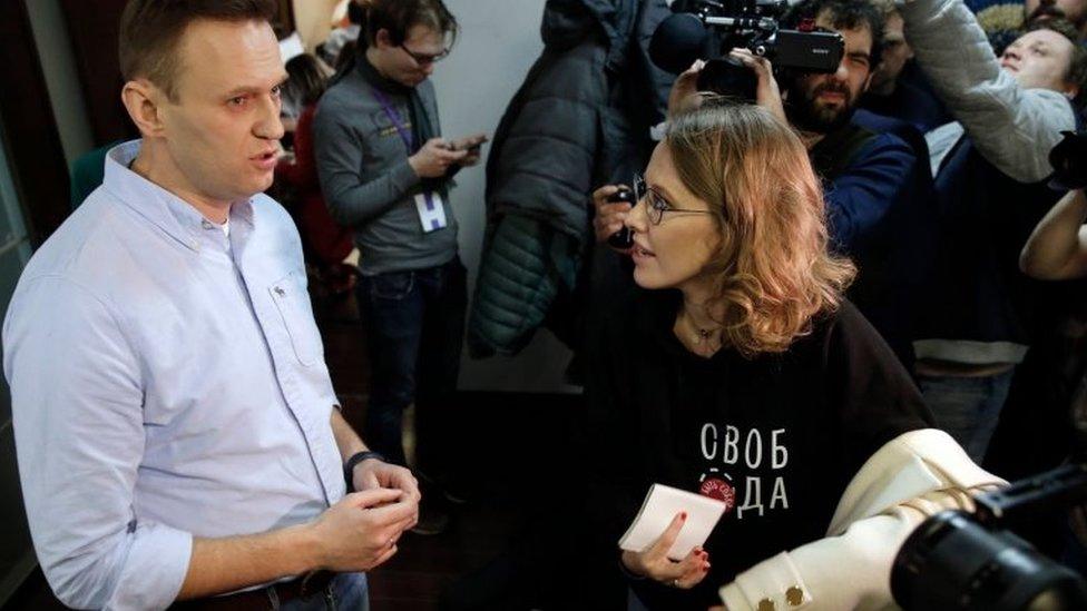 Navalny and TV journalist Ksenia Sobchak speak at event on polling day