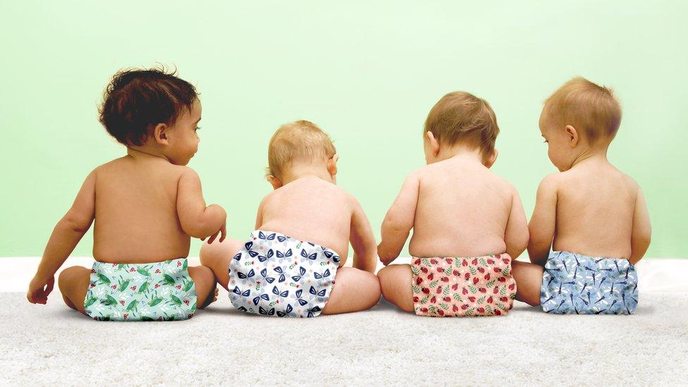 babies wearing reusable nappies