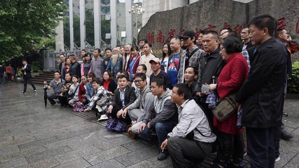 Supporters of lawyer Xie Yang outside the Intermediate People's Court in Changsha (25 April 2017)