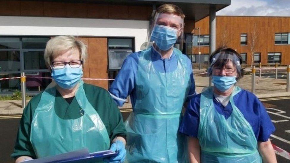 Matthew Tovey (centre) with colleagues