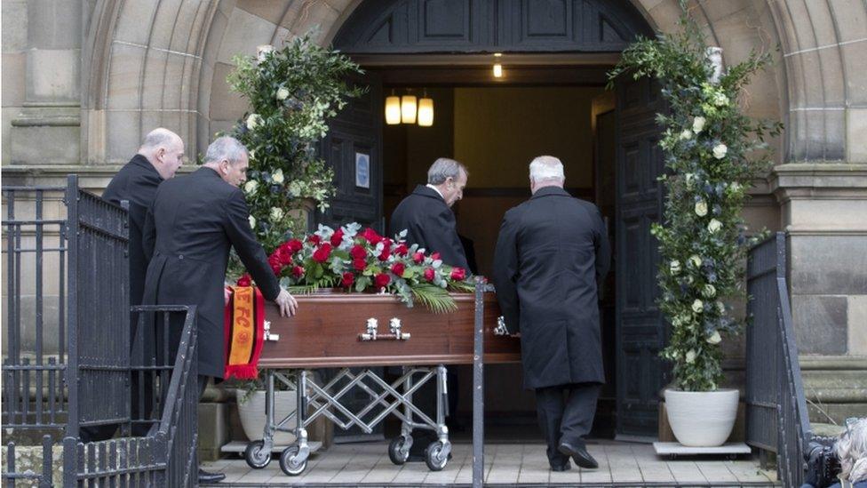 The coffin of EuroMllions winner Colin Weir arrives for the funeral service at Partick Burgh Hall.