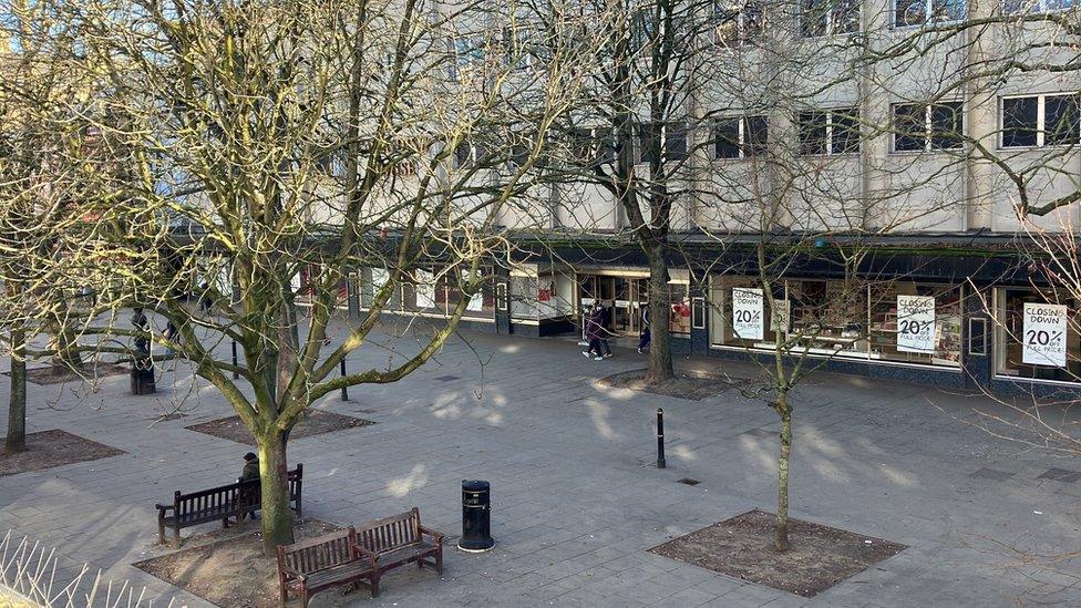 Cavendish House shown from the street with House of Fraser closing down sale signs