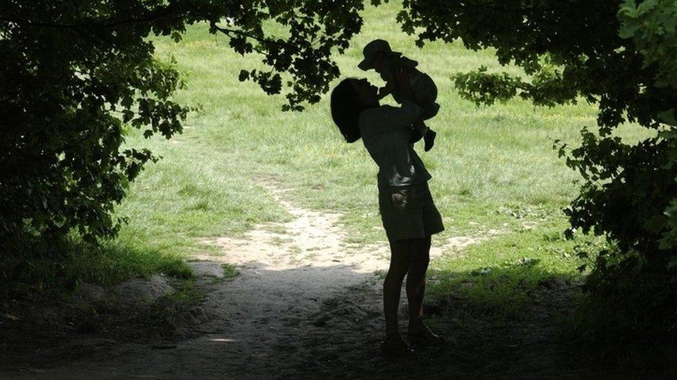 Parent with her daughter