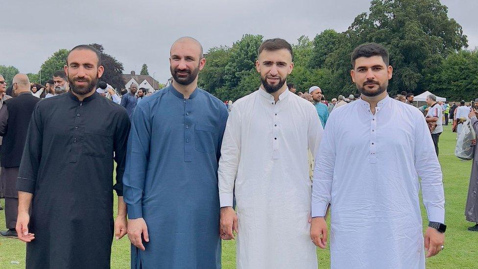 Masters student Irfan Ullah (far right) returned home to Luton's Wardown Park to celebrate and say prayers with his cousins and friends