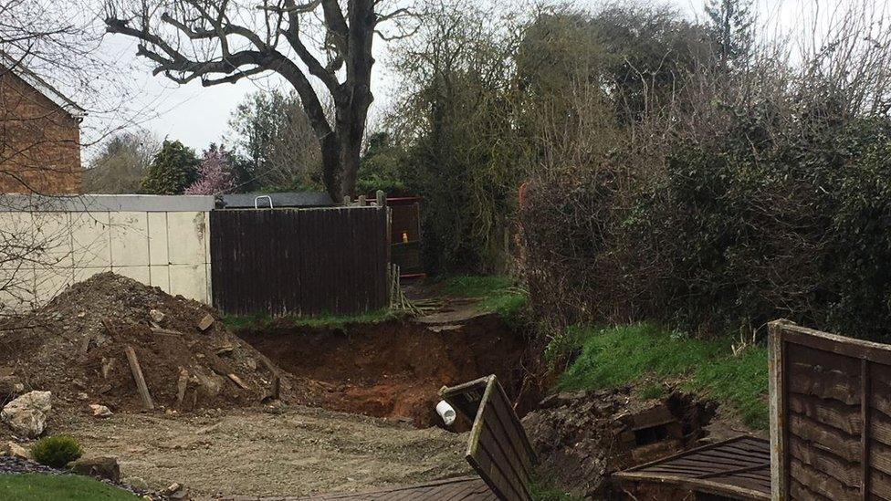 The hole at the end of a driveway