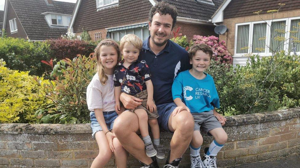 Dylan Almond (right), 6, with his father Darren, sister Francesca and brother Alfie