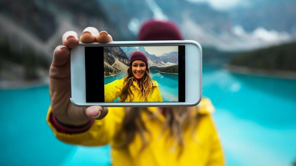 Woman taking a selfie