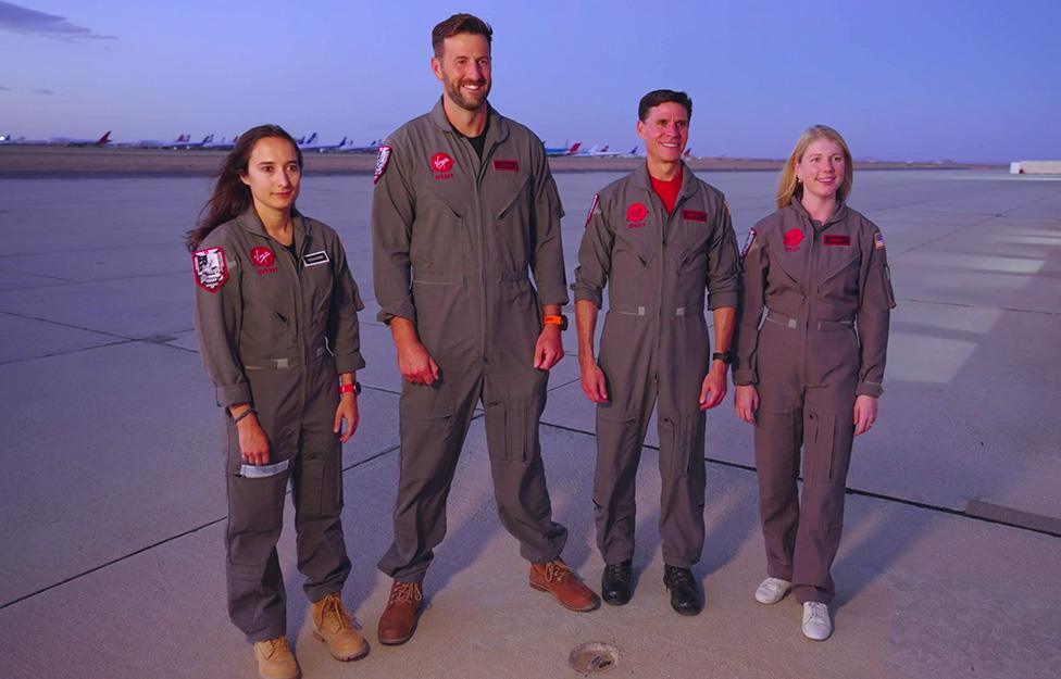 Matthew Stannard (centre-left) and crew