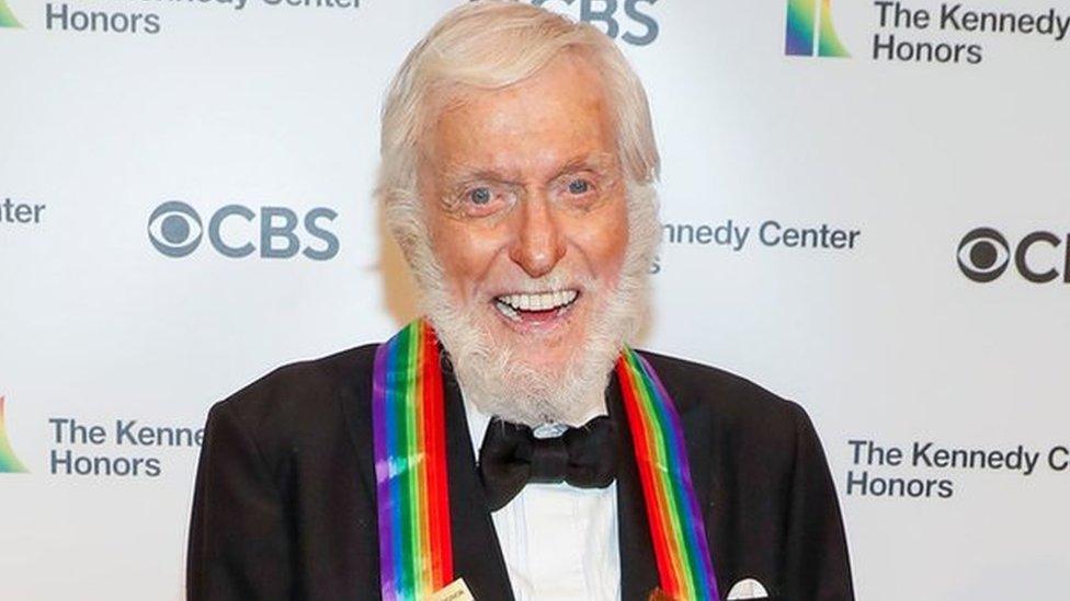 Dick Van Dyke smiles for cameras on the red carpet.