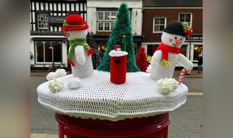 A festive postbox topper