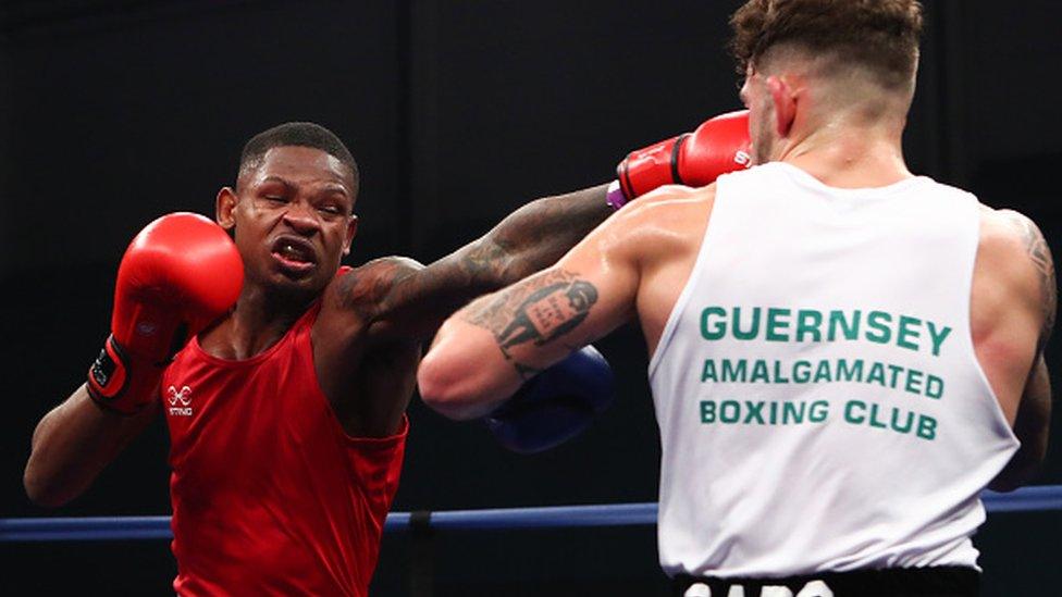 Ramtin Musah at a boxing match