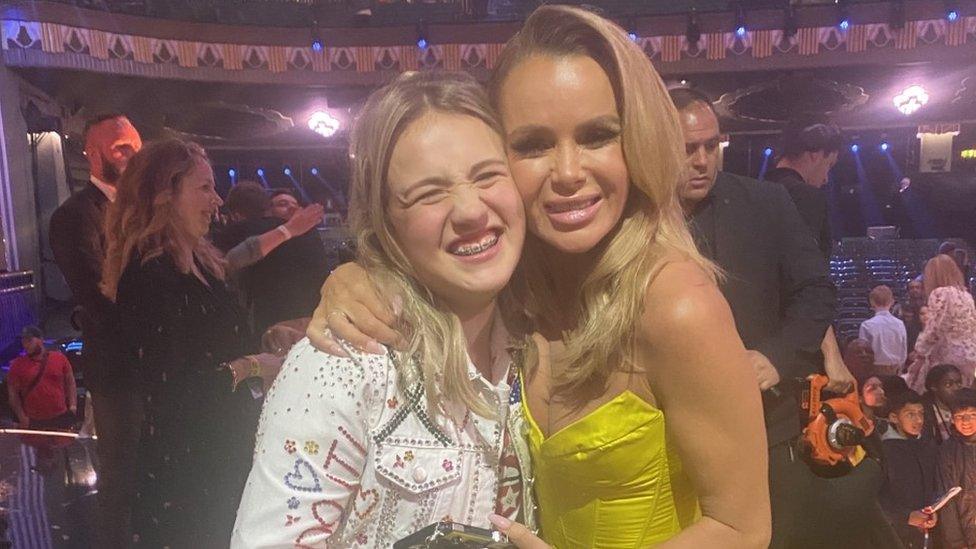 Eva alongside judge Amanda Holden