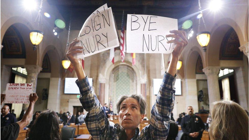 A protester at city hall