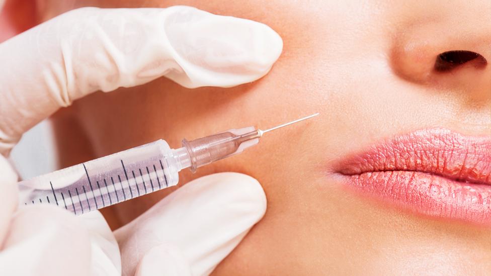 Stock image of a Botox syringe