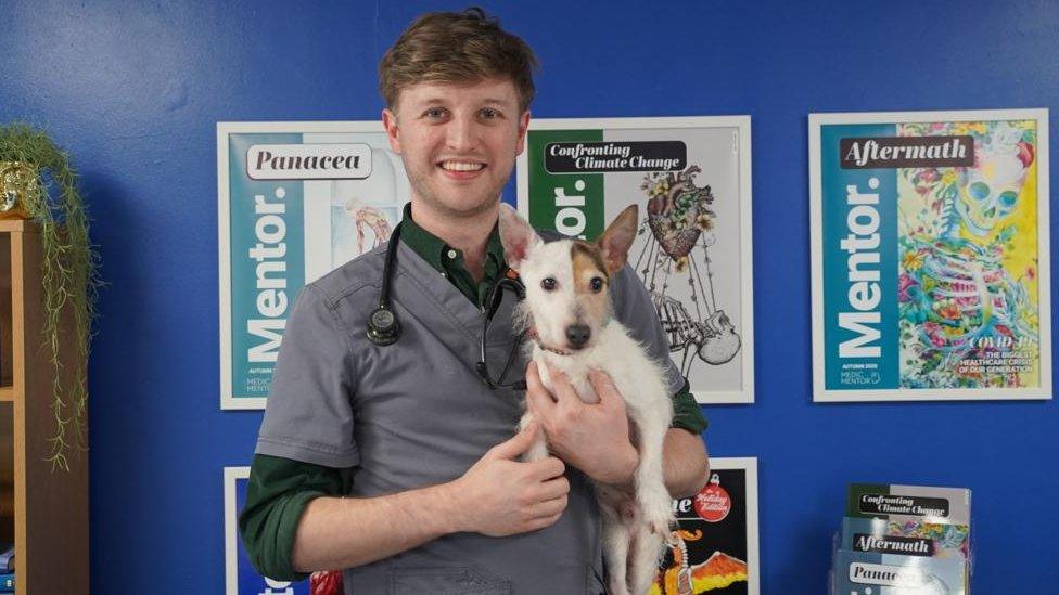 Dr Alex Davies with a dog