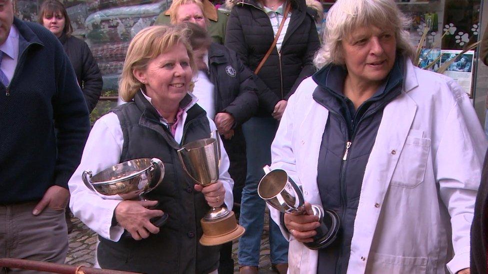 Women and prizes at the farming show