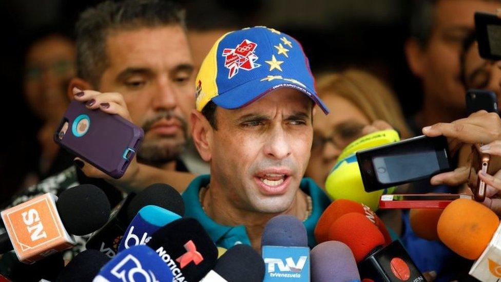 Venezuela's opposition leader Henrique Capriles speaks to the media after casting his vote during a nationwide elections for new governors in Caracas, Venezuela, October 15, 2017.