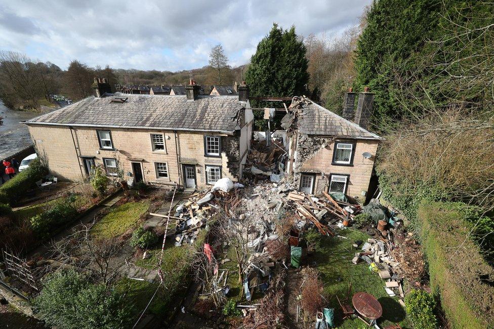 An aerial view of a collapsed terrace house in Bury, Greater Manchester