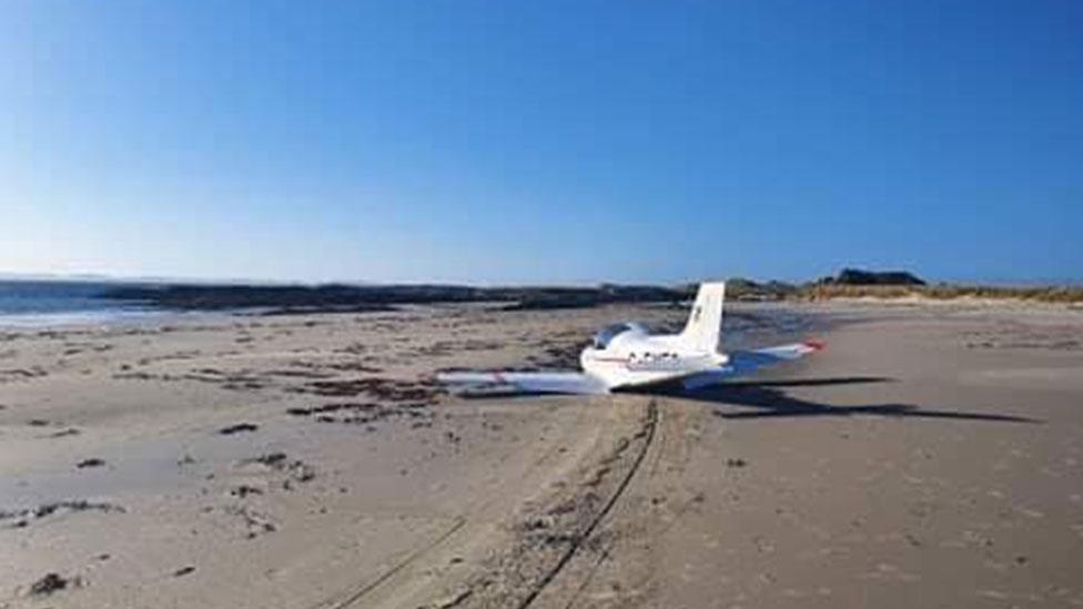 Light aircraft on Jura beach