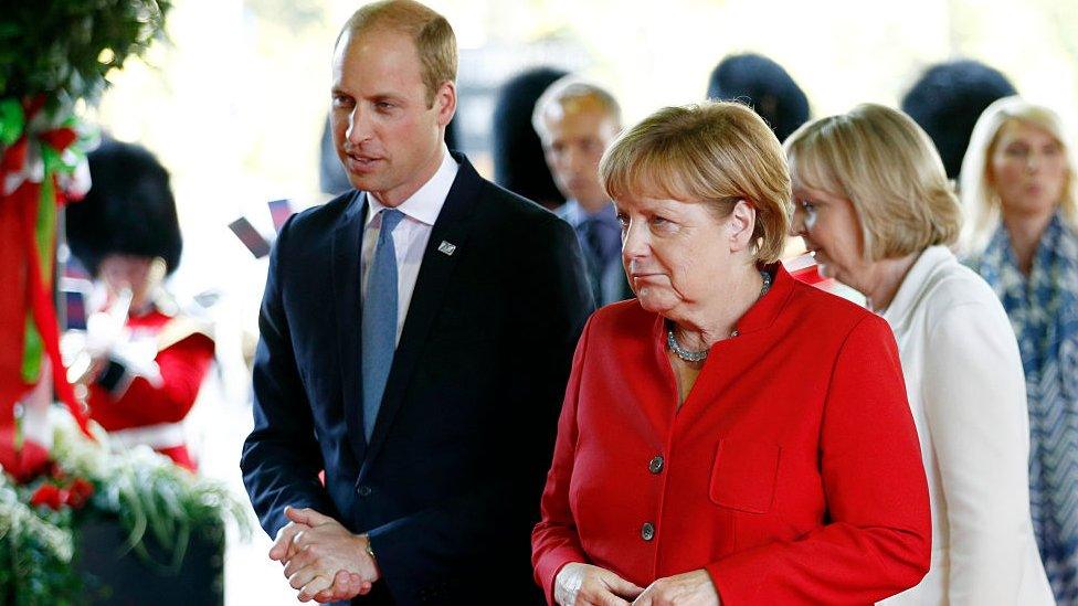 Duke of Cambridge with Angela Merkel in Dusseldorf in August 2016