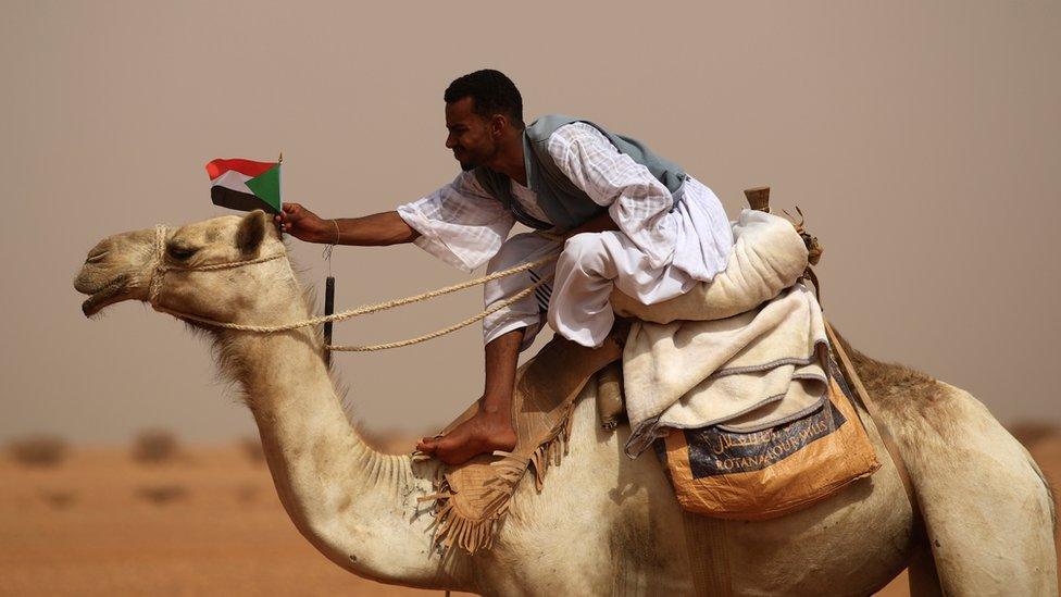 A supporter of Mohamed Hamdan "Hemedti" Dagalo outside Khartoum, Sudan