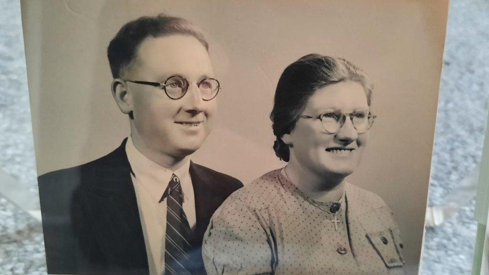 A black and white photo of a couple