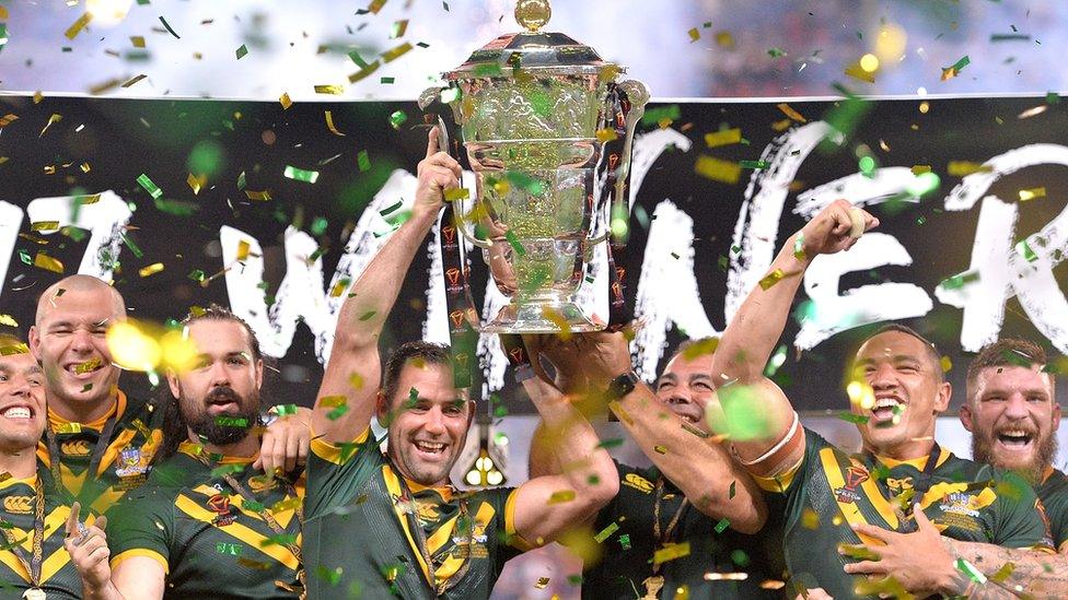 The Australian Kangaroos celebrate victory as captain Cameron Smith holds up the world cup trophy after the 2017 Rugby League World Cup Final between the Australian Kangaroos and England at Suncorp Stadium on December 2, 2017 in Brisbane, Australia.