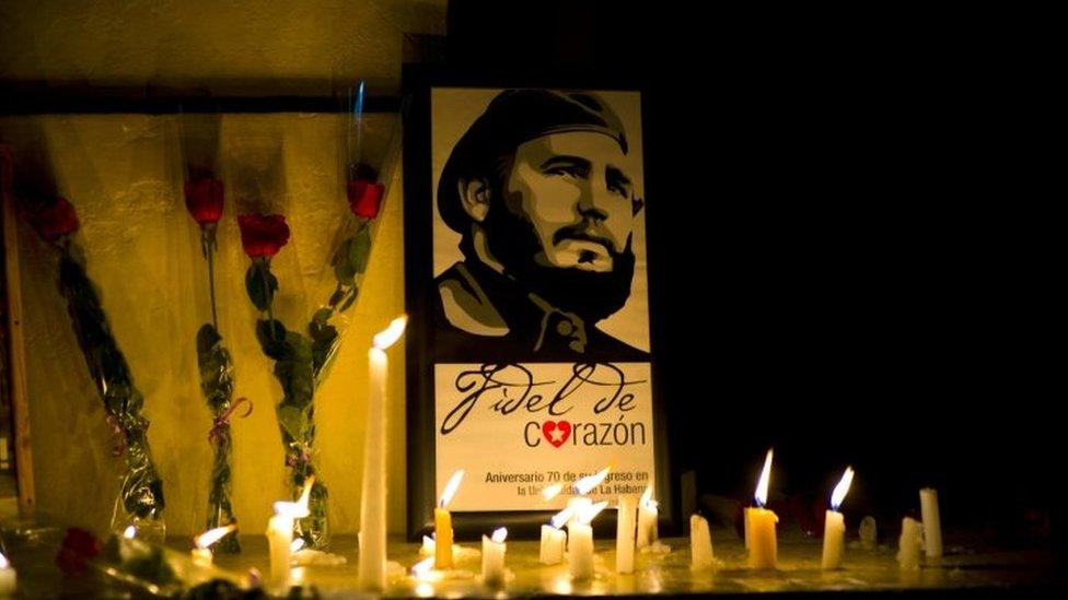 Candles and flowers around a picture of Fidel Castro in Havana. Photo: 26 November 2016