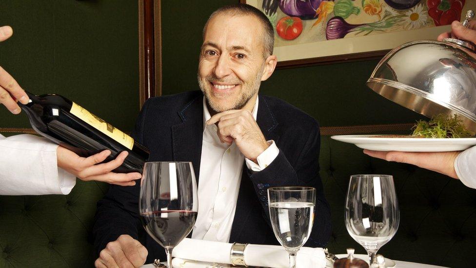 Michel Roux Jr sat at a table