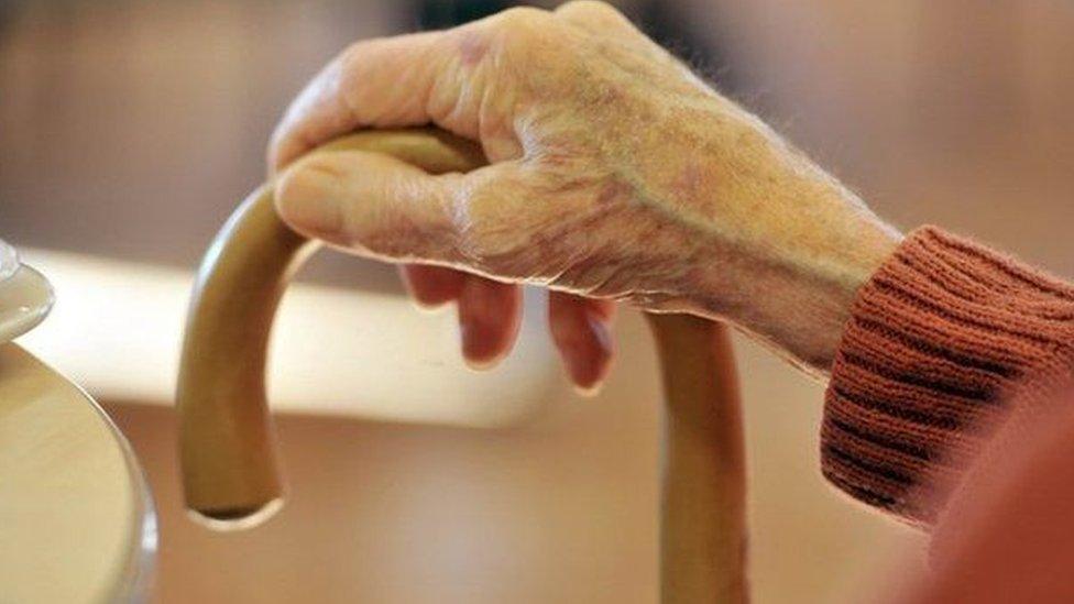 View of an elderly person's hand