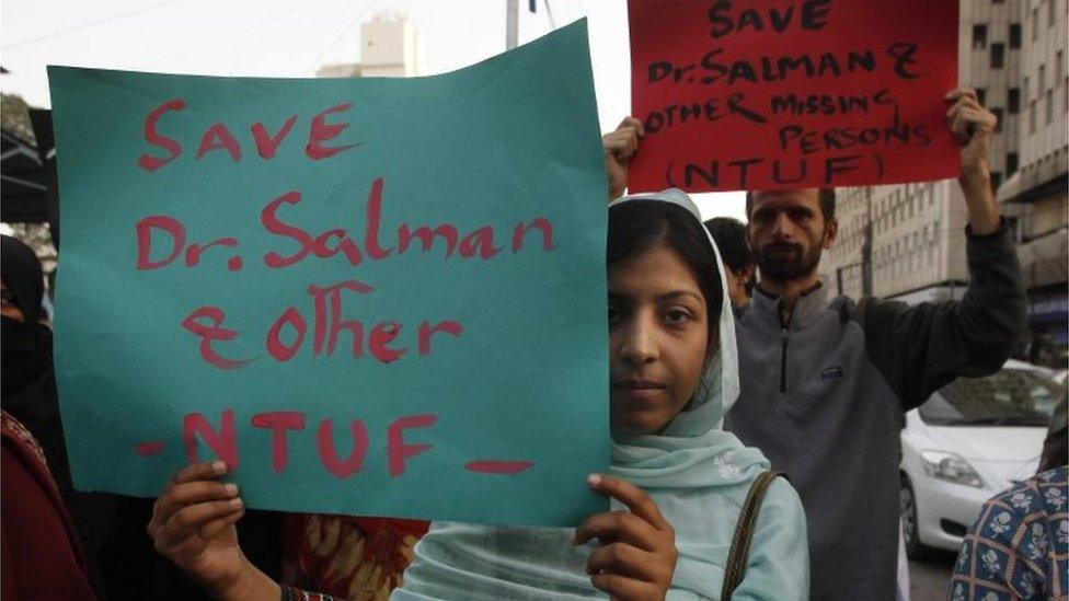 Activists of Pakistan civil society rally to condemn the missing human rights activist Salman Haider, in Karachi, Pakistan, Monday, Jan. 9, 2017.