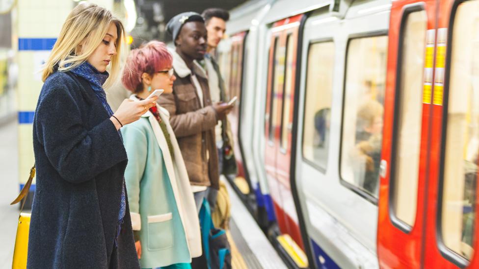 People waiting for the Tube