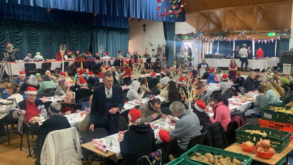 People at a food bank Christmas lunch in Kidlington, Oxfordshire