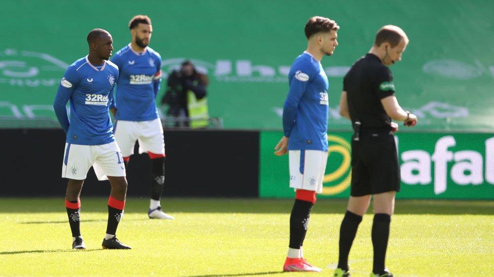 Rangers player Glen Kamara (left) and team mates take a stand rather than taking a knee before a match between Celtic and Rangers