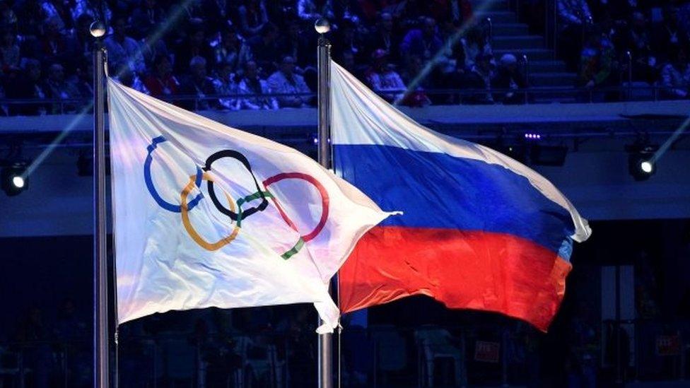 Olympic and Russian flags at the Sochi Winter Olympics. Photo: February 2014