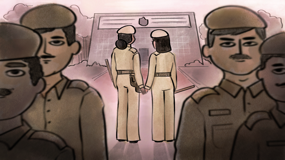 The women holding hands