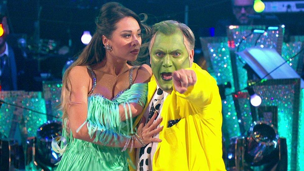 Ed Balls performing as The Mask