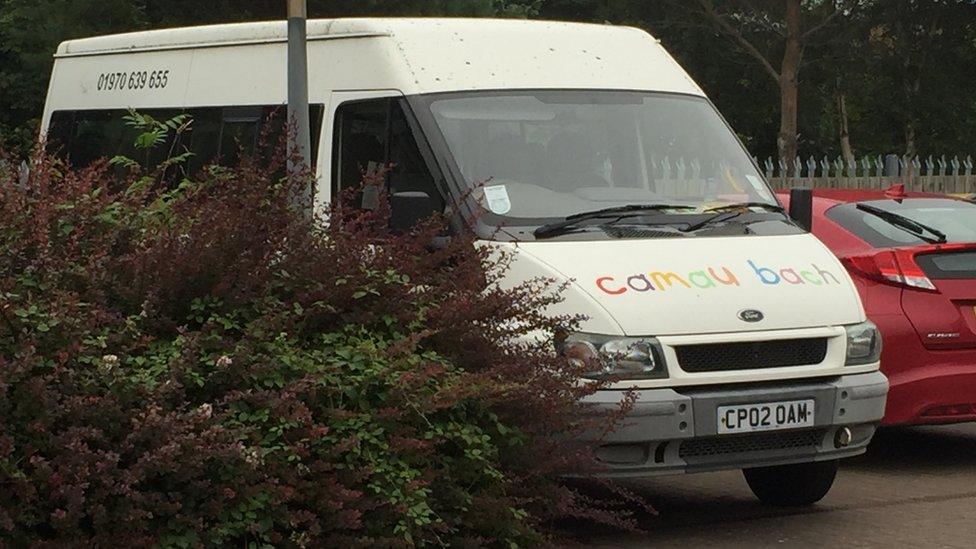 A minibus parked at Camau Bach