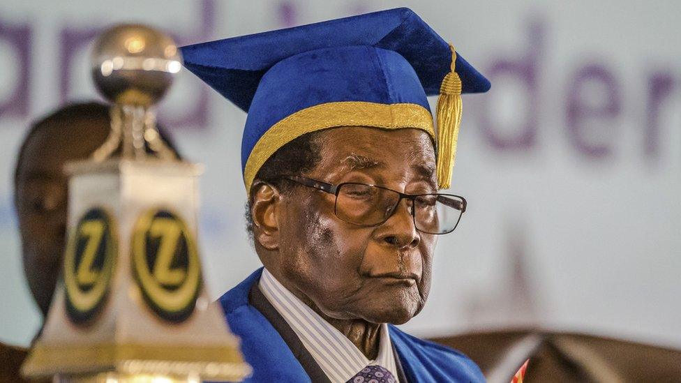 Mr Mugabe, 93, in cap and gown, as he presides over a graduation ceremony this week