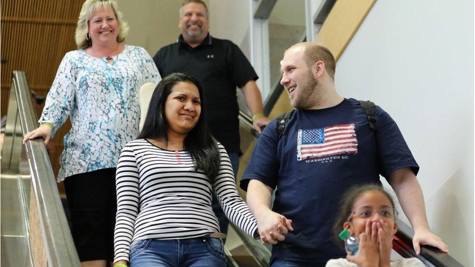 Mr Holt and his family at the airport