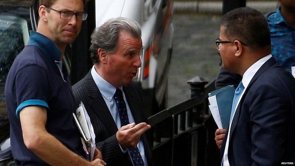 Three Conservative MPs, Oliver Letwin, Tobias Ellwood and Alok Sharma, speaking outside the Houses of Parliament