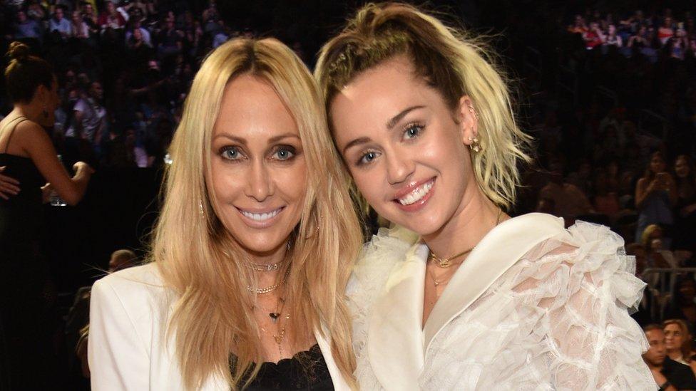 Tish and Miley Cyrus.