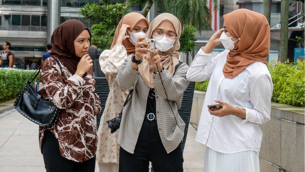 Screengrab from video - young Malaysians