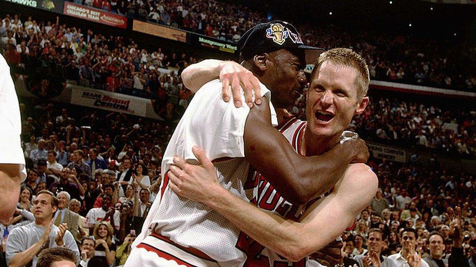 Michael Jordan and Steve Kerr celebrating Chicago Bulls